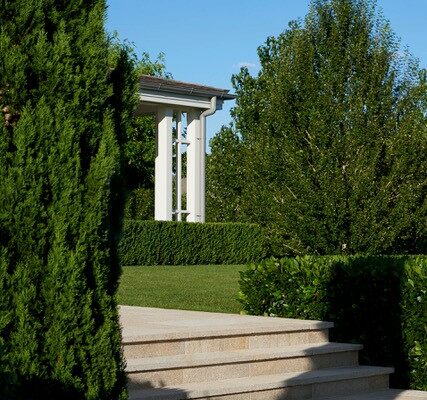 Golden Sands Granite Paving in picturesque country garden.